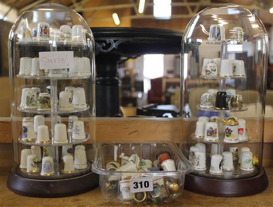 Collection of thimbles in glass dome